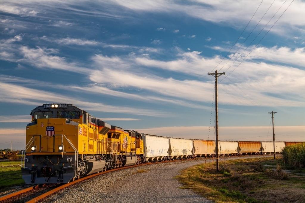 UP train hauls grain products. | L
